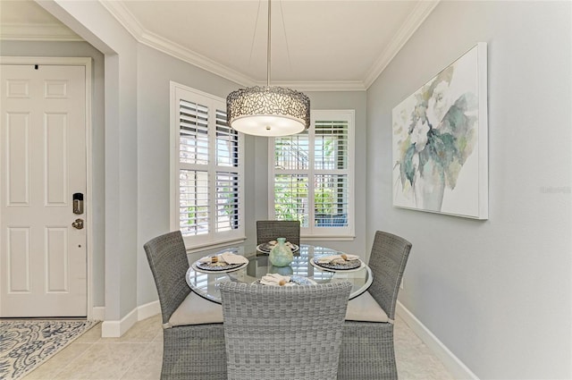 13609 Messina Loop Unit 104, Bradenton, FL 34211 - dining room with ornamental molding, baseboards, and light tile patterned flooring