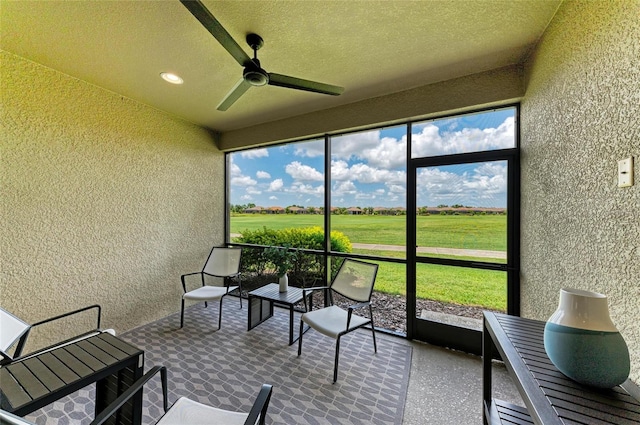 13609 Messina Loop Unit 104, Bradenton, FL 34211 - sunroom featuring a ceiling fan