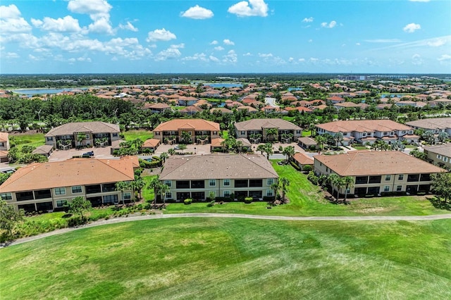 13609 Messina Loop Unit 104, Bradenton, FL 34211 - aerial perspective of suburban area featuring a large body of water
