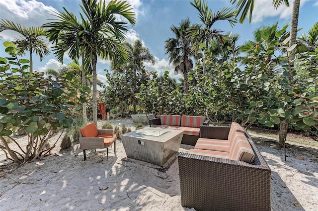13609 Messina Loop Unit 104, Bradenton, FL 34211 - view of patio / terrace featuring an outdoor living space with a fire pit
