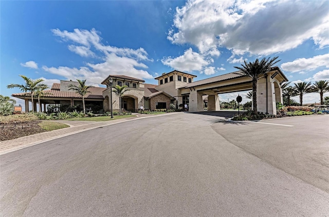 13609 Messina Loop Unit 104, Bradenton, FL 34211 - view of asphalt road featuring curbs