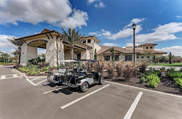 13609 Messina Loop Unit 104, Bradenton, FL 34211 - view of property featuring uncovered parking