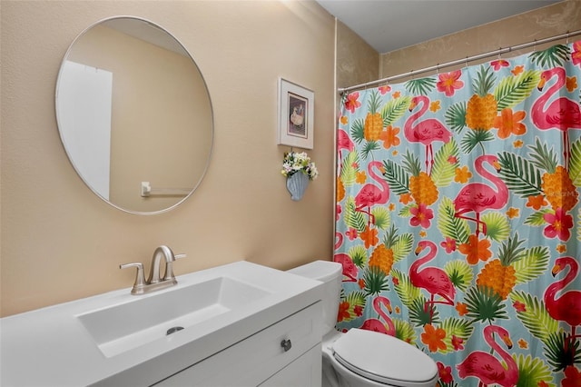 3362 Sandleheath Unit 12, Sarasota, FL 34235 - full bathroom featuring vanity, toilet, and curtained shower