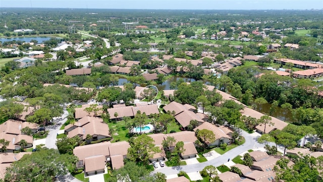 3362 Sandleheath Unit 12, Sarasota, FL 34235 - aerial overview of property's location featuring a large body of water and nearby suburban area