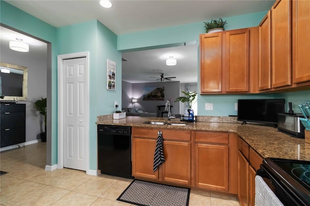 8937 Excelsior Loop, Venice, FL 34293 - kitchen with black appliances, a sink, ceiling fan, and dark stone countertops