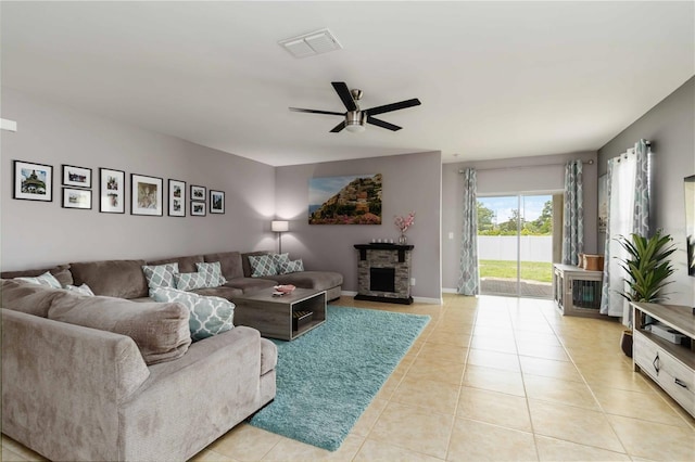 8937 Excelsior Loop, Venice, FL 34293 - living room featuring ceiling fan, light tile patterned flooring, and baseboards