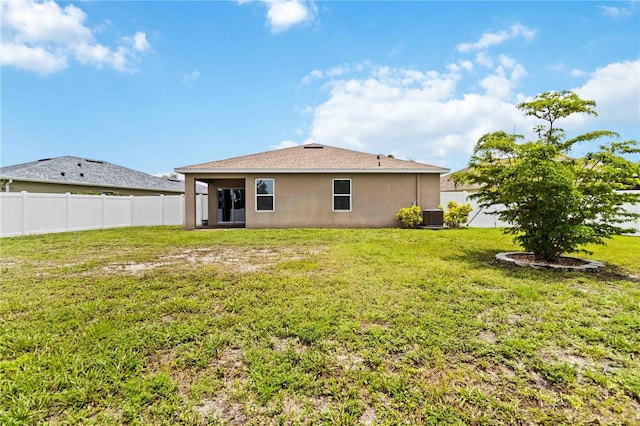 8937 Excelsior Loop, Venice, FL 34293 - rear view of property featuring central AC unit and stucco siding