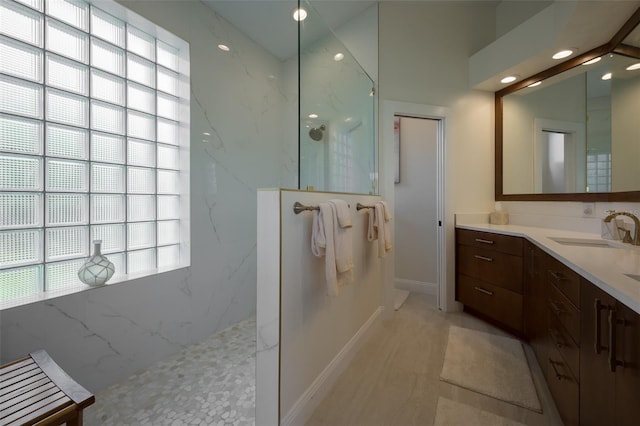 7952 Hampton Ct, University Park, FL 34201 - full bathroom with a marble finish shower, vanity, recessed lighting, and baseboards