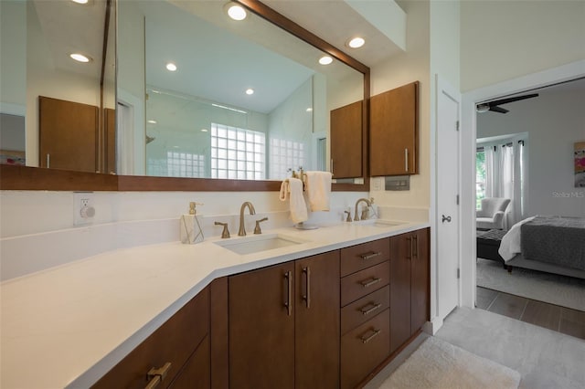 7952 Hampton Ct, University Park, FL 34201 - bathroom featuring ensuite bathroom, double vanity, recessed lighting, a ceiling fan, and a shower