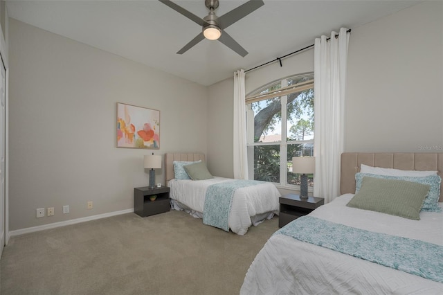 7952 Hampton Ct, University Park, FL 34201 - bedroom with carpet floors, baseboards, and ceiling fan