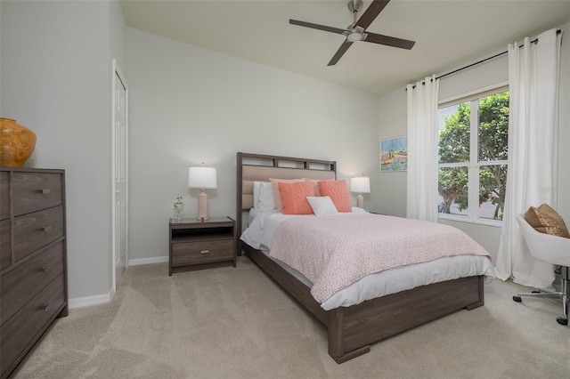 7952 Hampton Ct, University Park, FL 34201 - carpeted bedroom with baseboards and ceiling fan