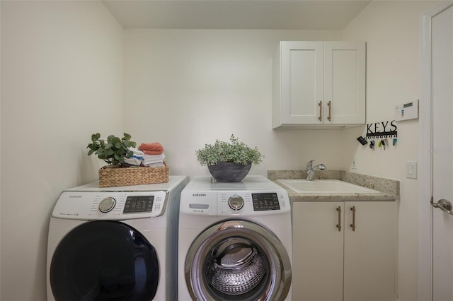 7952 Hampton Ct, University Park, FL 34201 - washroom featuring washing machine and clothes dryer and cabinet space