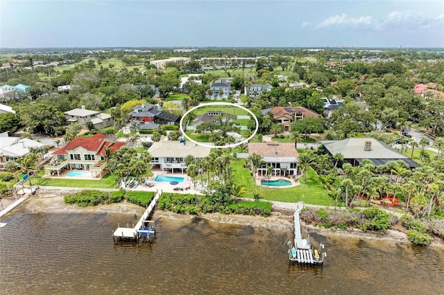 3903 Bayside Dr, Bradenton, FL 34210 - aerial perspective of suburban area with a pool and a nearby body of water