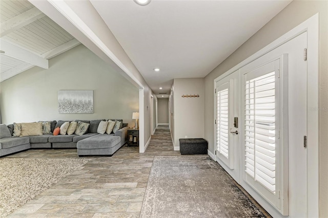 3903 Bayside Dr, Bradenton, FL 34210 - entrance foyer with recessed lighting, light wood-style flooring, beamed ceiling, and baseboards