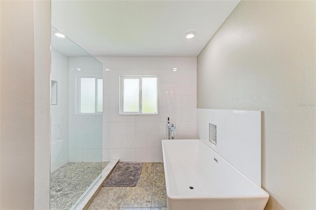 3903 Bayside Dr, Bradenton, FL 34210 - full bath with a freestanding tub, a walk in shower, and recessed lighting