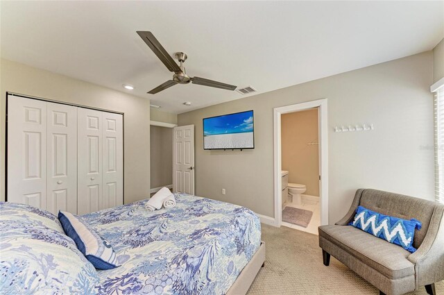 3903 Bayside Dr, Bradenton, FL 34210 - bedroom featuring light carpet, a closet, recessed lighting, a ceiling fan, and connected bathroom