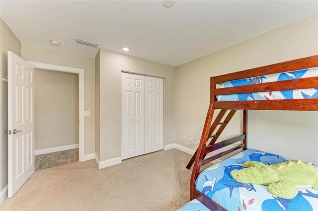 3903 Bayside Dr, Bradenton, FL 34210 - carpeted bedroom with baseboards, a closet, and recessed lighting