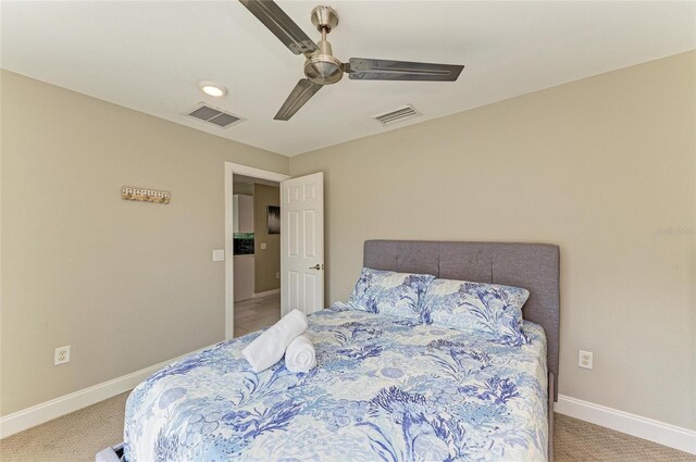 3903 Bayside Dr, Bradenton, FL 34210 - bedroom featuring carpet, baseboards, and ceiling fan