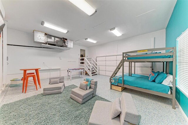 3903 Bayside Dr, Bradenton, FL 34210 - bedroom with baseboards and speckle patterned floor