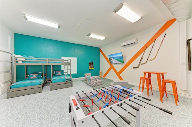 3903 Bayside Dr, Bradenton, FL 34210 - game room with an AC wall unit, carpet floors, and baseboards