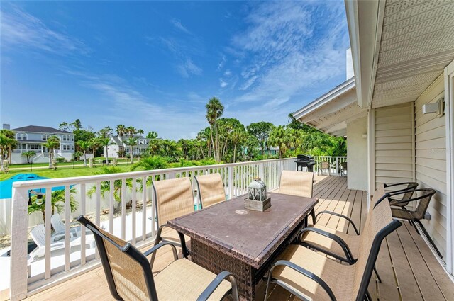 3903 Bayside Dr, Bradenton, FL 34210 - deck with outdoor dining space