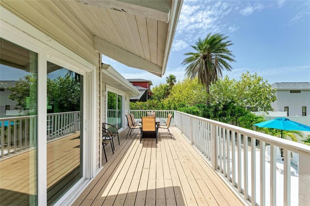 3903 Bayside Dr, Bradenton, FL 34210 - wooden terrace featuring outdoor dining space