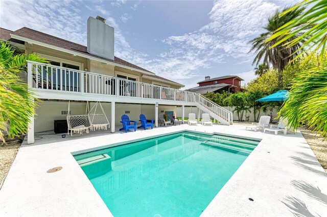 3903 Bayside Dr, Bradenton, FL 34210 - view of swimming pool with stairway and a patio