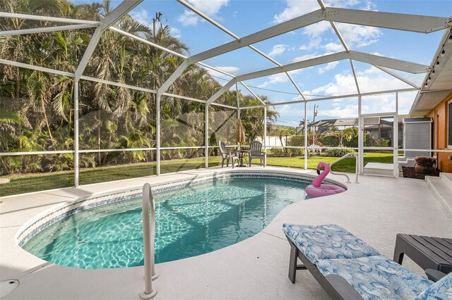 5323 SW 22nd Pl, Cape Coral, FL 33914 - swimming pool featuring a patio area, a yard, and glass enclosure