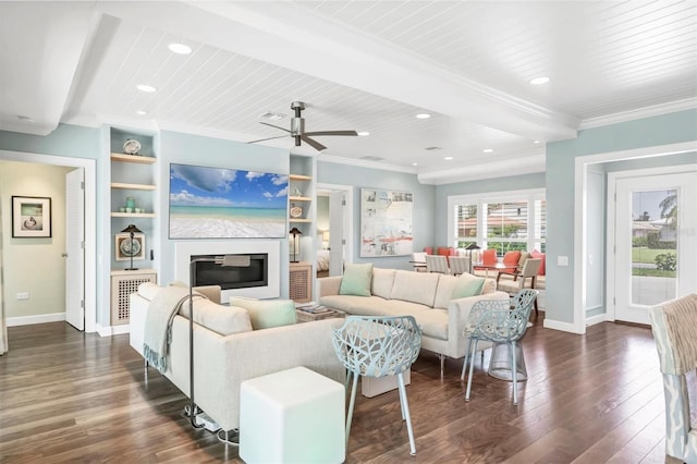 510 Wedge Ln, Longboat Key, FL 34228 - living room with dark wood-style floors, baseboards, crown molding, recessed lighting, and a glass covered fireplace