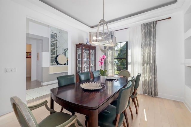 826 Honeyflower Loop, Bradenton, FL 34212 - dining area featuring a chandelier and baseboards
