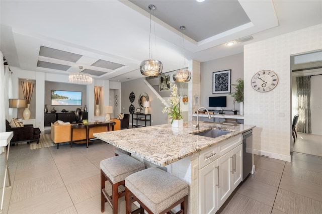 826 Honeyflower Loop, Bradenton, FL 34212 - kitchen featuring coffered ceiling, dishwasher, light stone counters, white cabinets, and decorative light fixtures