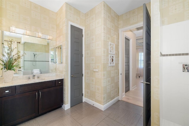 826 Honeyflower Loop, Bradenton, FL 34212 - full bathroom featuring vanity and wallpapered walls