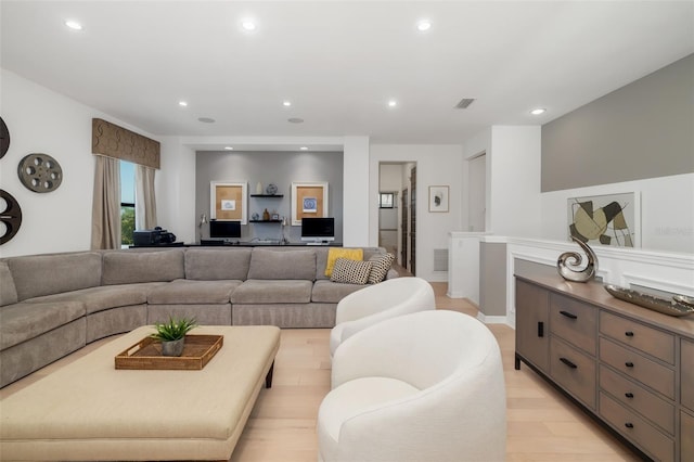 826 Honeyflower Loop, Bradenton, FL 34212 - living room featuring recessed lighting and light wood-type flooring