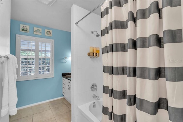 6731 Washington Pl, Bradenton, FL 34207 - full bath with shower / tub combo with curtain, tile patterned flooring, vanity, and baseboards