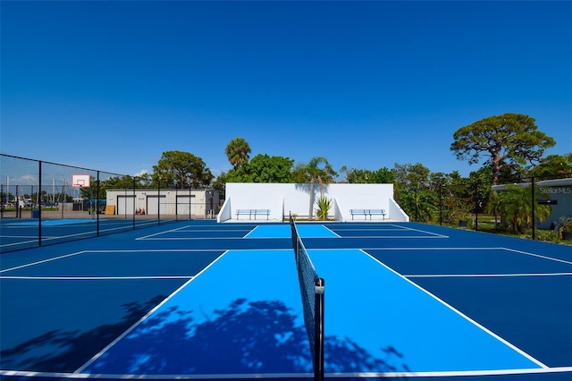 6731 Washington Pl, Bradenton, FL 34207 - view of tennis court featuring community basketball court