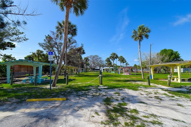 6731 Washington Pl, Bradenton, FL 34207 - view of property's community featuring a gazebo, a yard, and uncovered parking