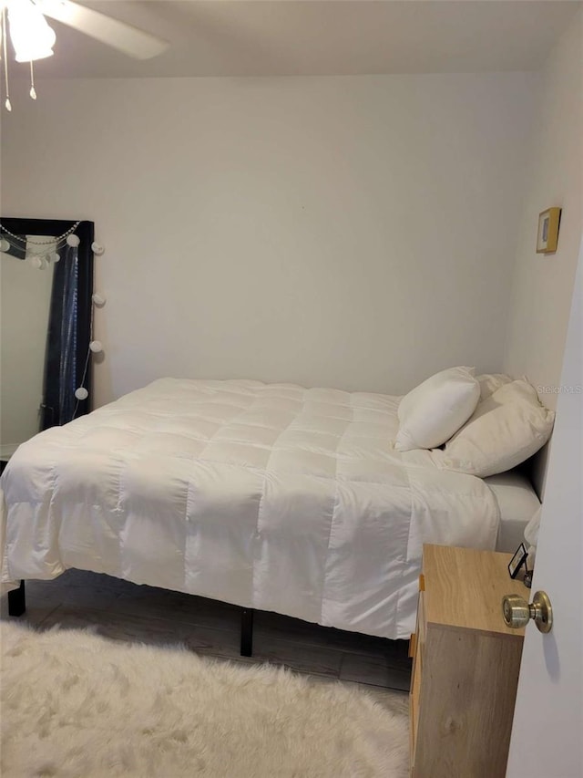 4835 Winslow Beacon Unit 46, Sarasota, FL 34235 - bedroom featuring light carpet and a ceiling fan