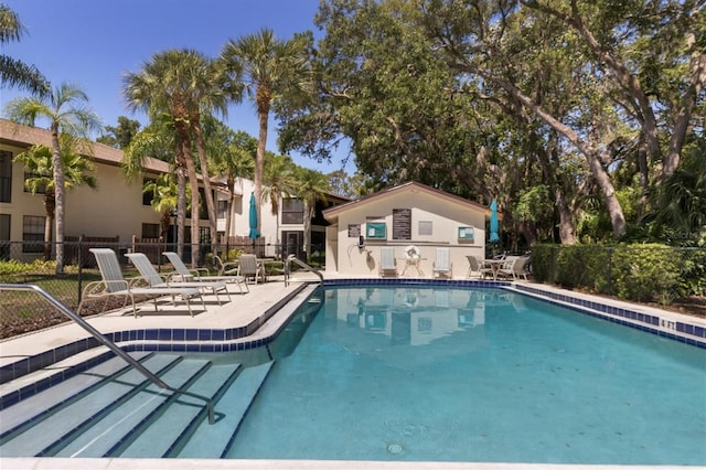 4835 Winslow Beacon Unit 46, Sarasota, FL 34235 - community pool featuring a patio area