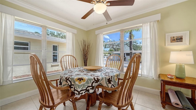 1116 S Moonmist Ct Unit M12, Sarasota, FL 34242 - dining room featuring light tile patterned floors, a ceiling fan, and crown molding