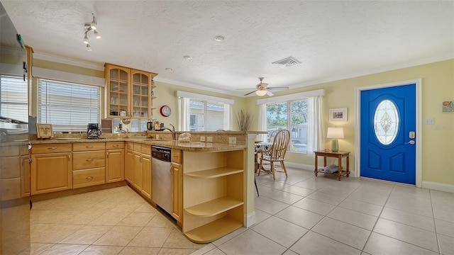 1116 S Moonmist Ct Unit M12, Sarasota, FL 34242 - kitchen featuring stainless steel dishwasher, open shelves, a peninsula, ornamental molding, and light tile patterned floors