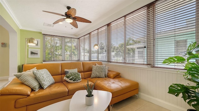 1116 S Moonmist Ct Unit M12, Sarasota, FL 34242 - sunroom / solarium with arched walkways, tile patterned floors, and ornamental molding