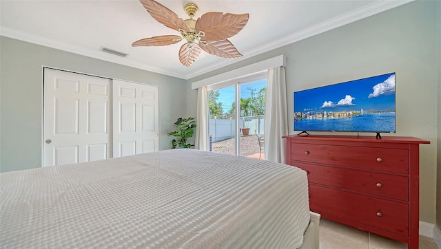 1116 S Moonmist Ct Unit M12, Sarasota, FL 34242 - bedroom featuring access to exterior, ornamental molding, a closet, light tile patterned floors, and a ceiling fan