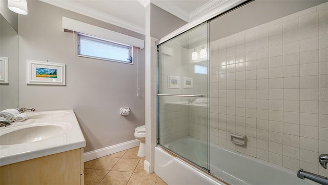1116 S Moonmist Ct Unit M12, Sarasota, FL 34242 - full bath with bath / shower combo with glass door, tile patterned flooring, crown molding, and double vanity
