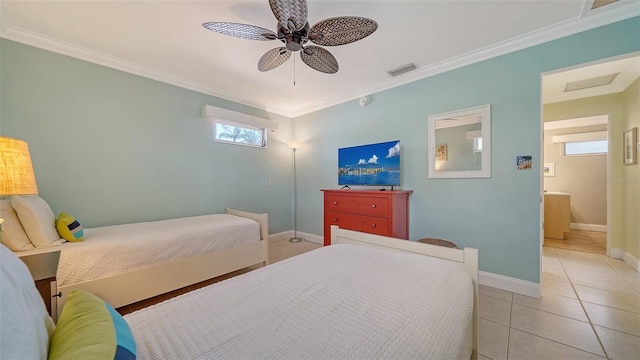 1116 S Moonmist Ct Unit M12, Sarasota, FL 34242 - bedroom with crown molding, light tile patterned flooring, and ceiling fan
