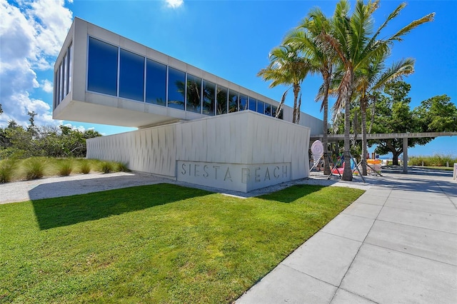 1116 S Moonmist Ct Unit M12, Sarasota, FL 34242 - view of side of home with a lawn