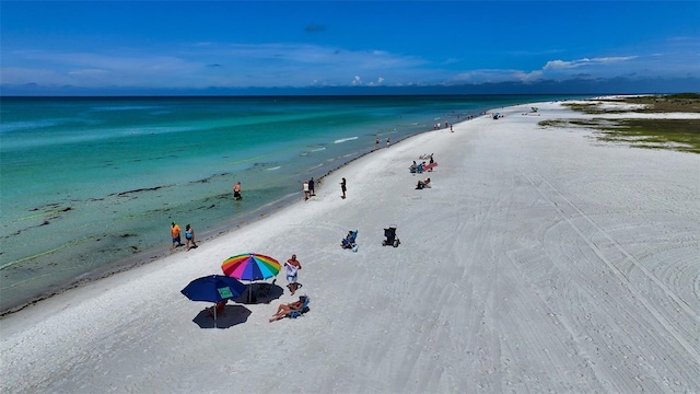 1116 S Moonmist Ct Unit M12, Sarasota, FL 34242 - water view featuring local beach