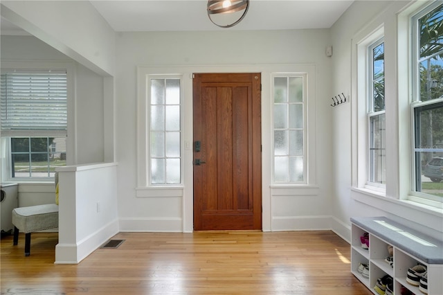 480 28th Ave N, Saint Petersburg, FL 33704 - foyer with light wood-type flooring and baseboards