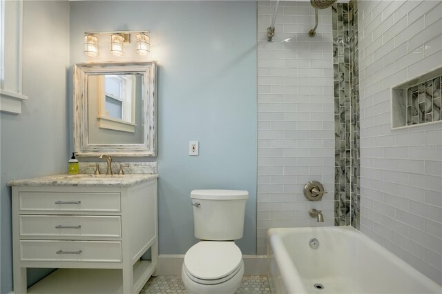 480 28th Ave N, Saint Petersburg, FL 33704 - full bath with vanity, toilet, shower / tub combination, and baseboards