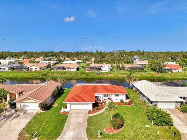 74 Windsor Dr, Englewood, FL 34223 - aerial perspective of suburban area featuring a nearby body of water