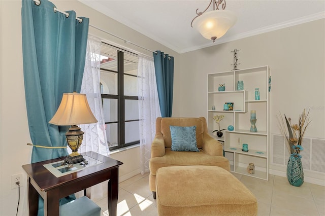74 Windsor Dr, Englewood, FL 34223 - living area with tile patterned floors and crown molding